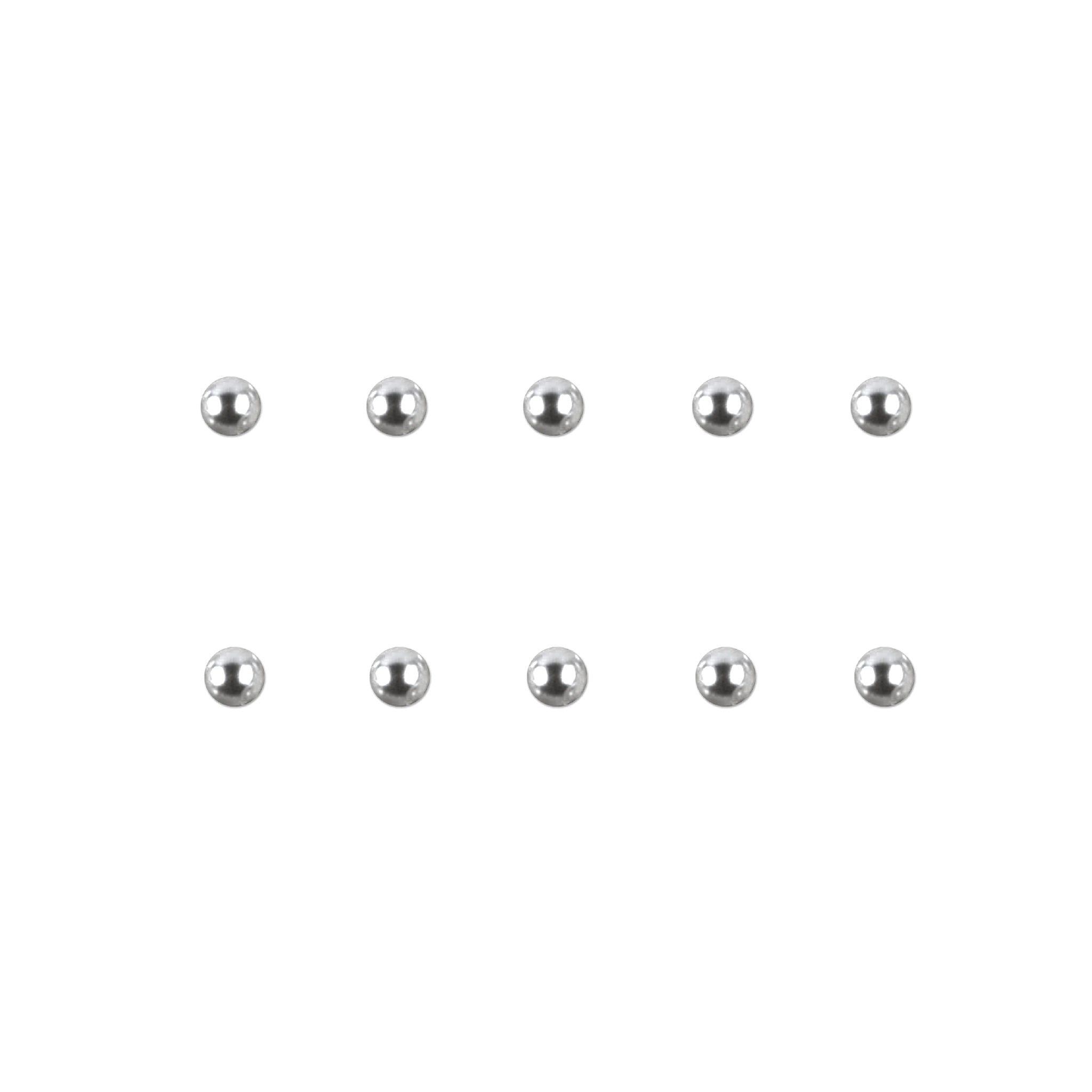 Set of silver chrome nail charms on a white background