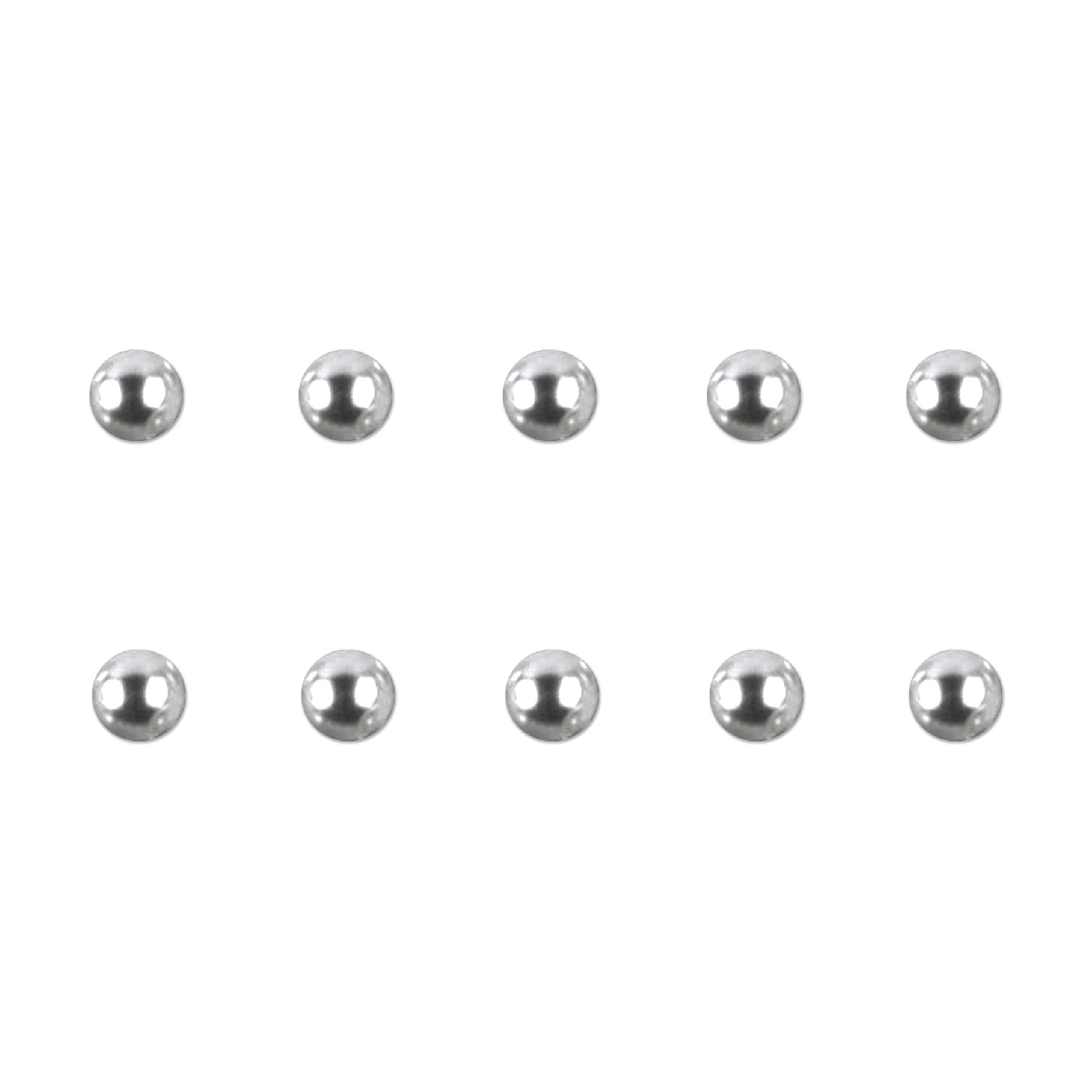 Set of silver chrome nail charms on a white background