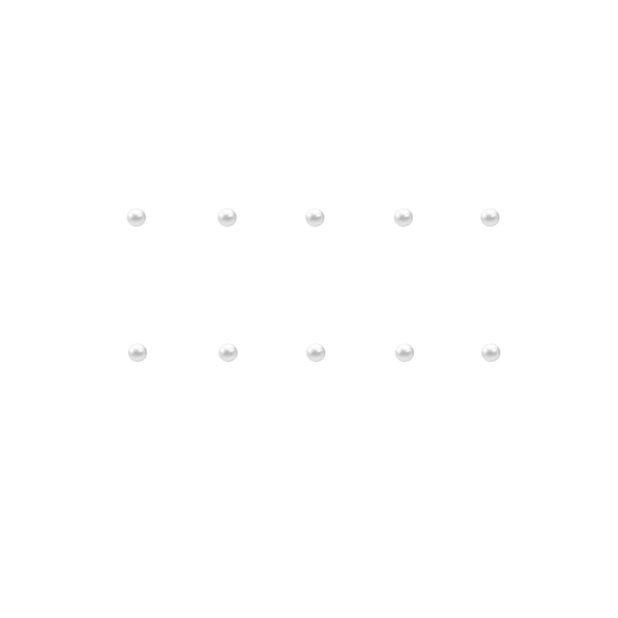 Set of small pearl nail charms on a white background